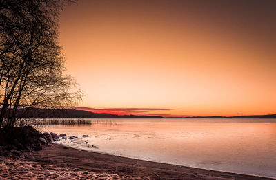 Scenic view of sea at sunset