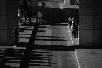 Low section of man walking on steps