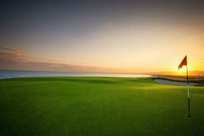 Scenic view of sea at sunset