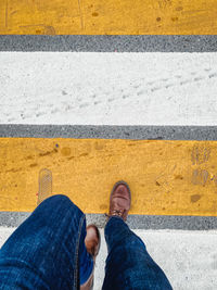 A man crossing a street