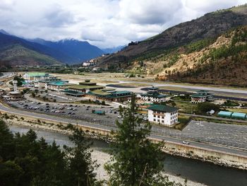 High angle view of road by mountain against sky