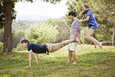 Friends having fun in park