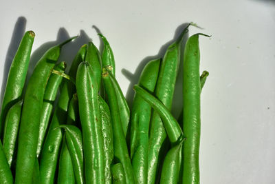 Close-up of green beans on table