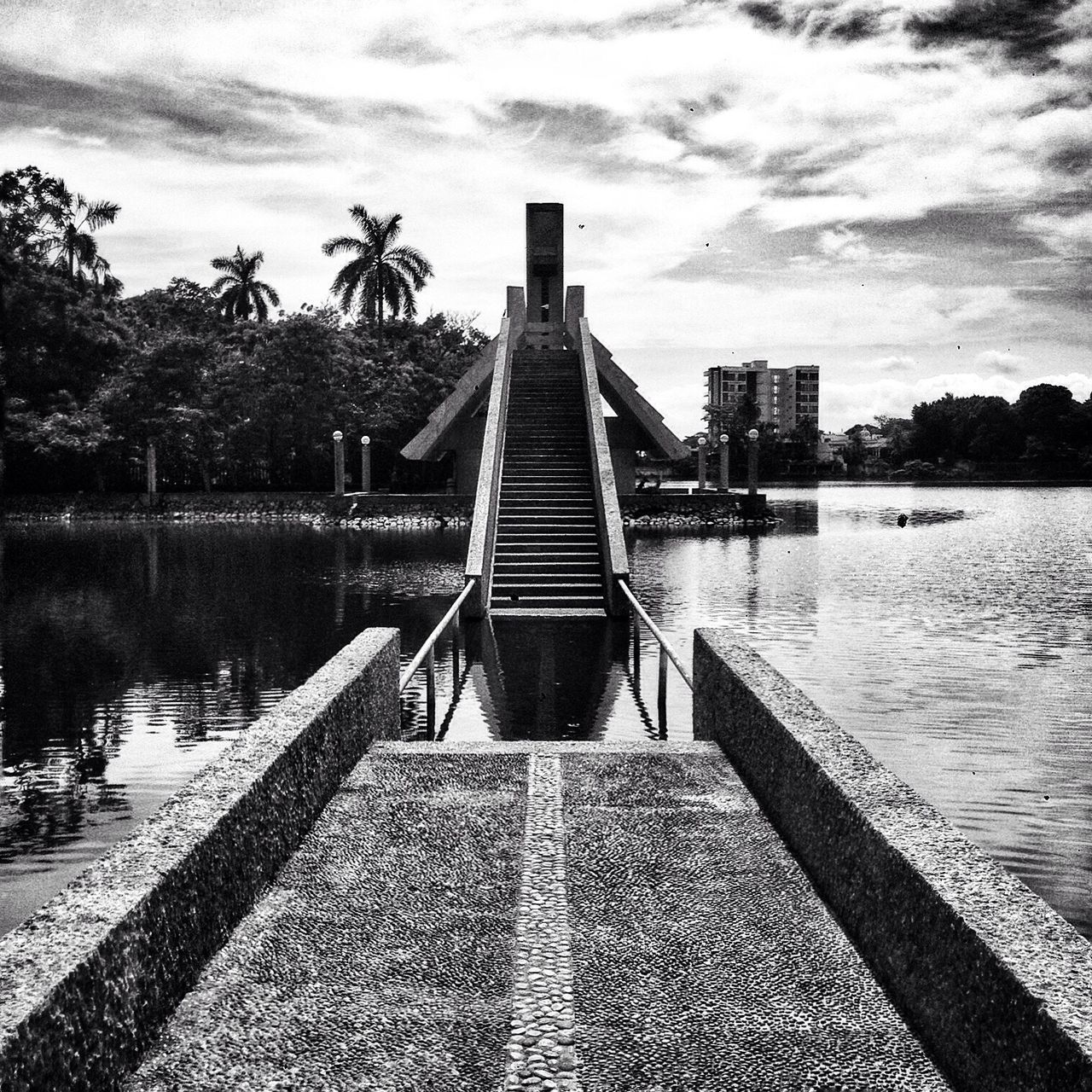 VIEW OF BUILT STRUCTURE BY LAKE