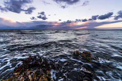 View of calm sea at sunset