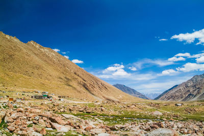 View of desert against blue sky