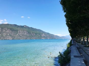Scenic view of sea against clear blue sky