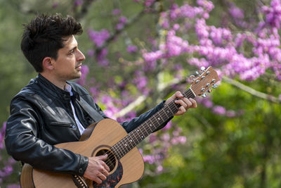 Young man playing guitar