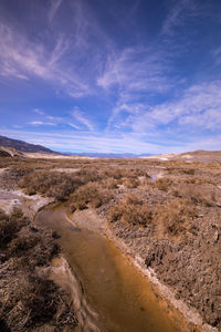 Scenic view of desert against sky