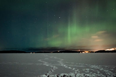Scenic view of sea against sky at night