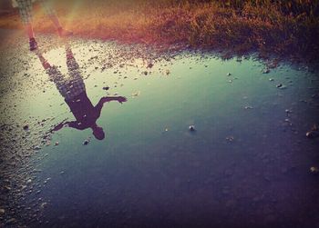 Reflection of people in water
