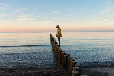 Woman in introspection at seaside