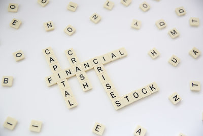 High angle view of crossword puzzle on white table