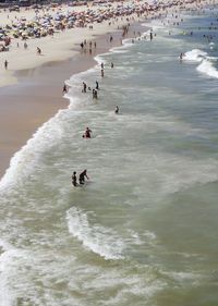 People enjoying at beach