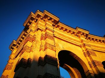 Low angle view of historical building against clear sky