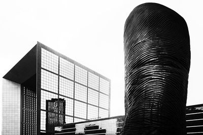 Low angle view of modern buildings against sky