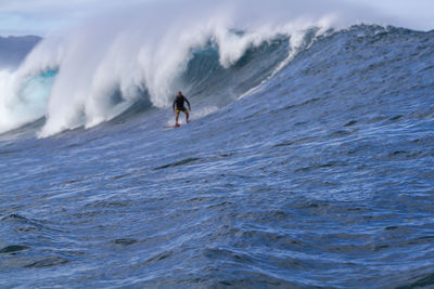 Man surfing in sea