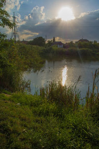 Scenic view of landscape against sky during sunset