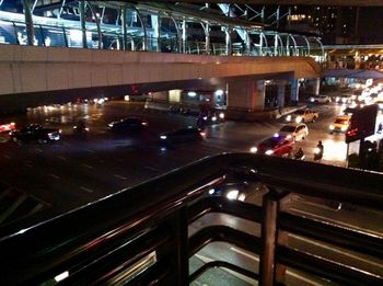 High angle view of cars on road in city at night