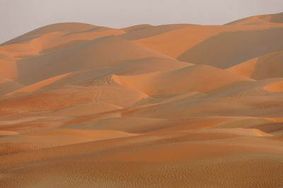 Scenic view of desert against clear sky