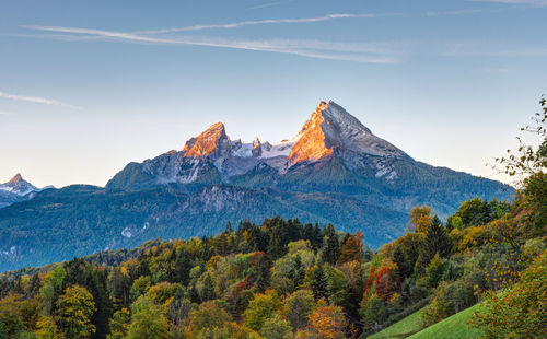 The first sunlight hits mount watzmann in the bavarian alps