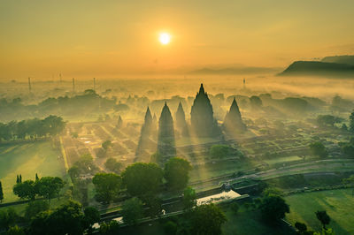 Prambanan temple yogyakarta indonesia panoramic view of buildings in city during sunset