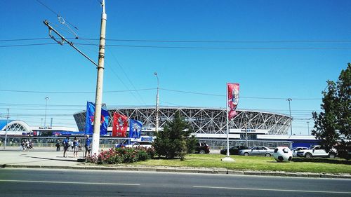 Street against clear blue sky