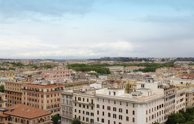 Rome and vatican city skyline from window of the vatican museum in cloudy day