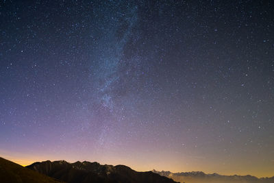 Scenic view of star field against sky at night