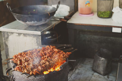 Close-up of beef grilling on barbecue grill