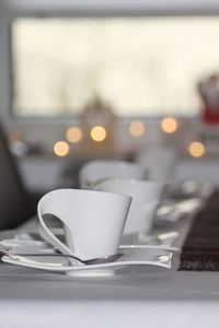 Close-up of coffee cup on table