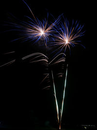 Close-up of firework display at night