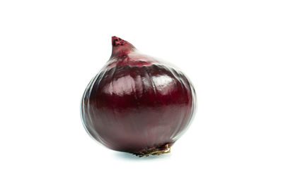 Close-up of wineglass against white background