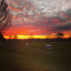 Scenic view of dramatic sky during sunset