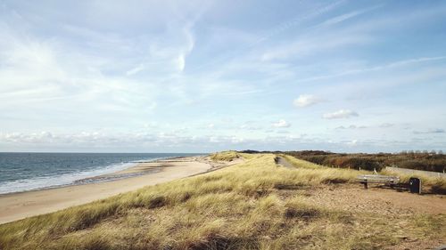 Scenic view of beach against sky