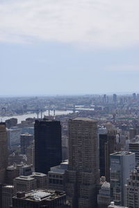 High angle view of buildings in city against sky