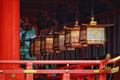 Illuminated lantern outside temple