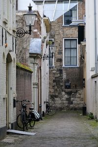 Street amidst buildings in city. 