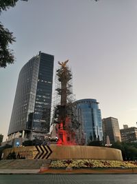 Low angle view of modern buildings against clear sky