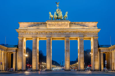 The brandenburg gate in berlin at dawn