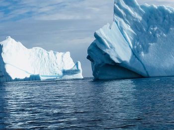 Scenic view of frozen sea against sky