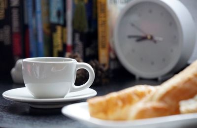 Close-up of coffee cup on table