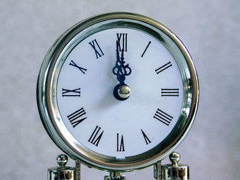 Close-up of clock at home