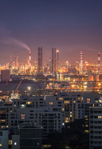 Illuminated buildings in city at night