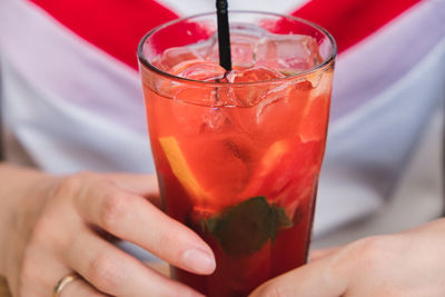 Close-up of hand holding drink