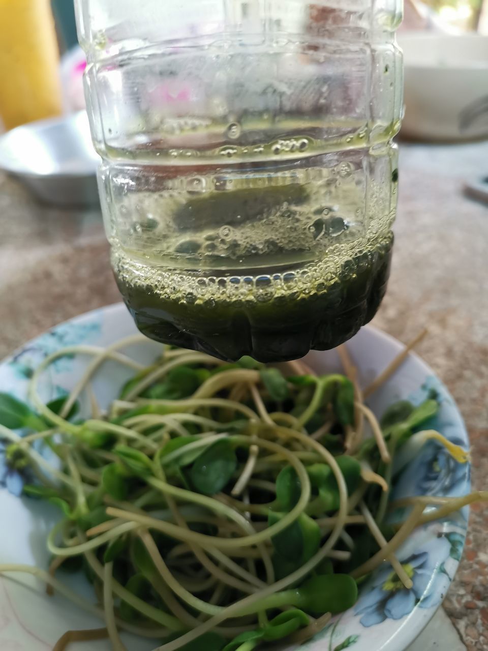 CLOSE-UP OF DRINK ON TABLE