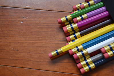 High angle view of colored pencils on table