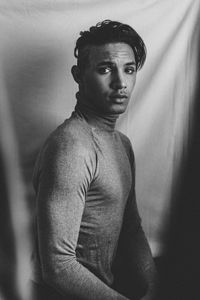 Portrait of young man looking away