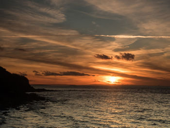 Scenic view of sea against sky during sunset