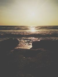 Scenic view of sea at sunset